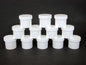 Set Of 12 White Plastic Jars/Caps - 2 oz. image 0
