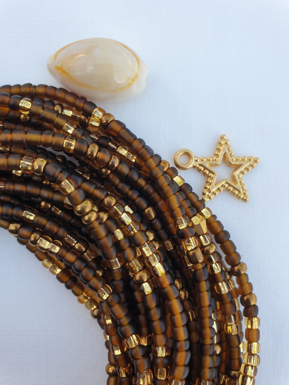 WAIST BEADS IN WARM TONES OF BROWN AND GOLD HAND MADE IN GHANA image 1